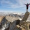 Man standing on edge of cliff