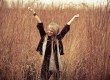 Woman stretching in wheat field