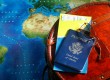 Suitcase, passport and map