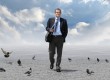 Businessman walking alone
