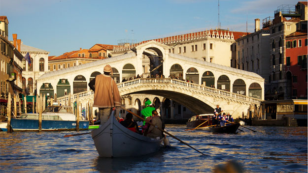 Gondola ride under Rialto Bridge