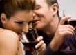 Couple flirting while drinking wine