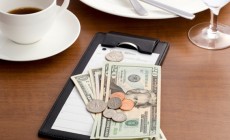 Guest check with cash and coin