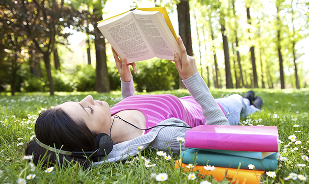 relaxing in nature with book and music