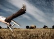 balancing on chair