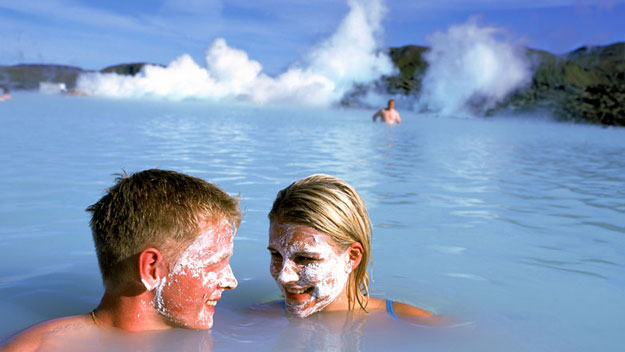 Couple bathing in the Blue Lagoon Geothermal Spa