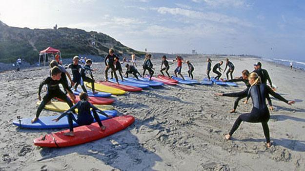 Group taking surf lessons