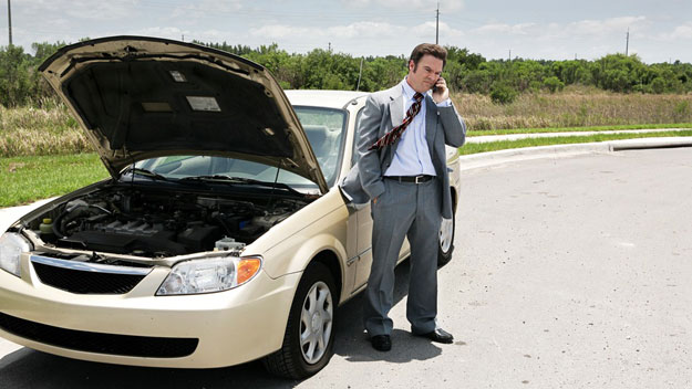 Man with car problems on side of road