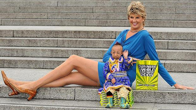 Shortest man next to woman with longest legs
