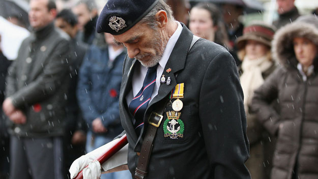 Veteran soldier observes silence