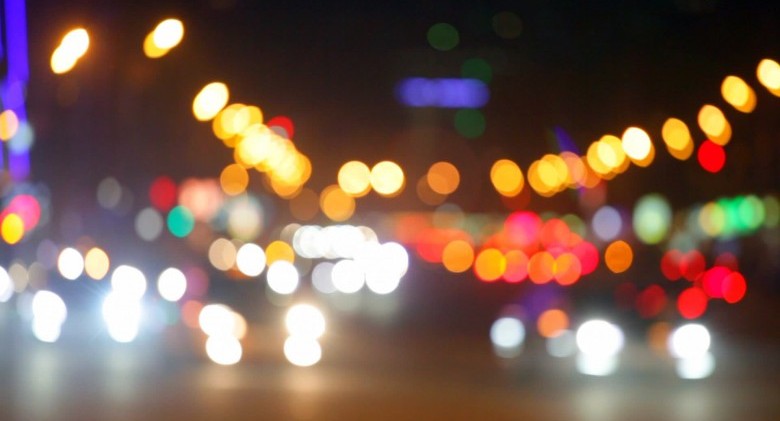 stock-footage-city-at-night-background-with-cars-out-of-focus-background-with-blurry-unfocused-city-lights