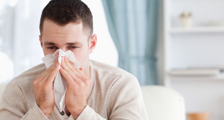 Man-blowing-his-nose