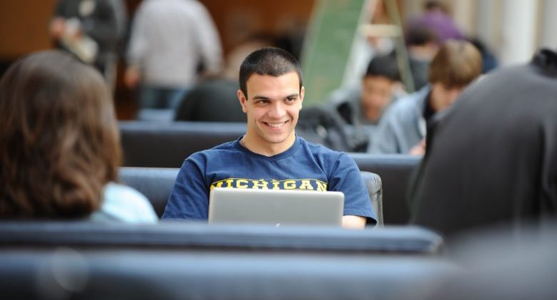 4/17/12 Business School student Mo Aslani, catches up on last minute class work on the last day of classes of the winter semester while sitting in the Winter Garden during a Day in the Life of the University of Michigan on April 17, 2012.