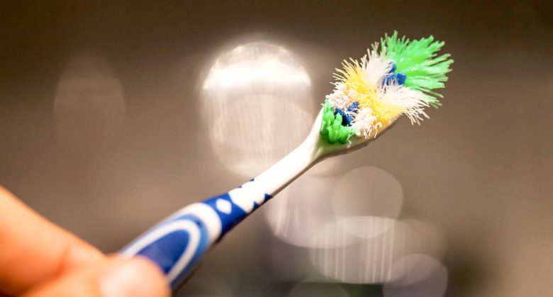 06-brushing-teeth-old-brush