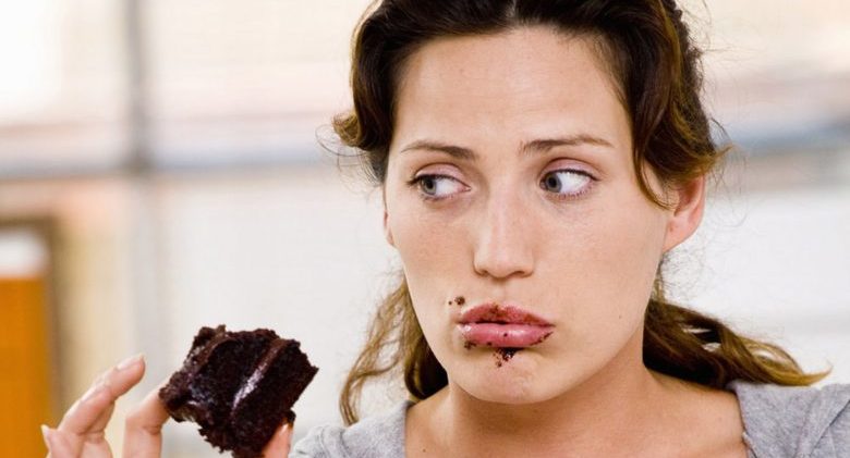 woman-eating-chocolate-cake-1512493