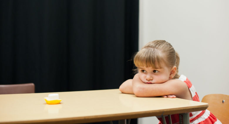 Evelyn Rose, 4 of Brighton, NY participates in an update of the classic "Stanford marshmallow experiment" studying the implications of delayed gratification at the University of Rochester Baby Lab September 6, 2012. // photo by J. Adam Fenster / University of Rochester