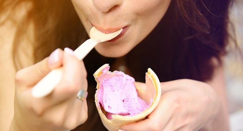 woman-eating-strawberry-ice-cream