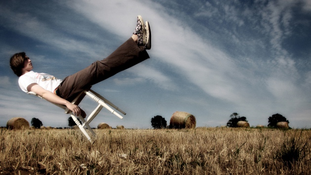 balancing on chair